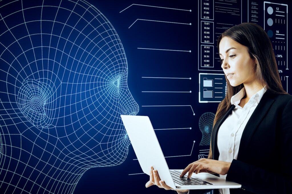 woman-using-laptop-with-futuristic-technology